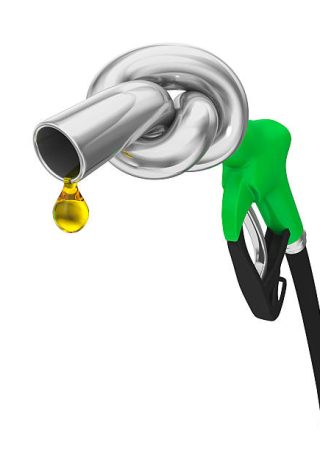 fuel nozzle tied in knot with droplet of petrol